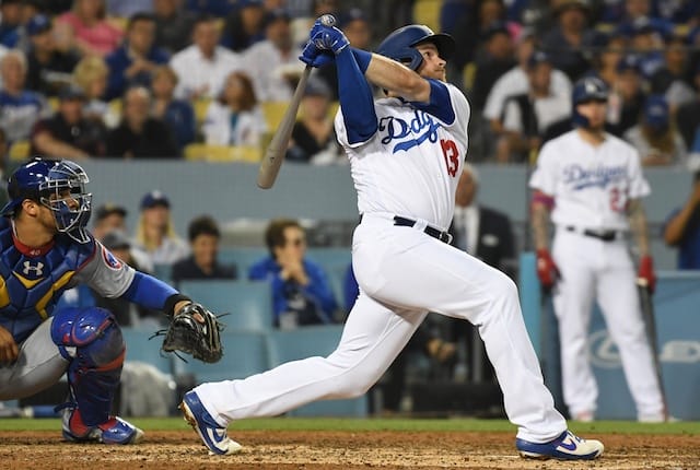 Los Angeles Dodgers first baseman Max Muncy hits a home run with Alex Verdugo on deck
