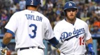 Los Angeles Dodgers shortstop Chris Taylor congratulates Max Muncy after a home run