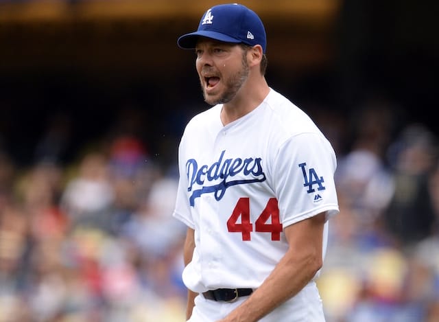 Los Angeles Dodgers starting pitcher Rich Hill reacts during a game against the Philadelphia Phillies