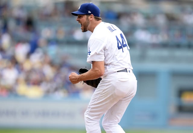 Los Angeles Dodgers starting pitcher Rich Hill reacts during a game against the Philadelphia Phillies