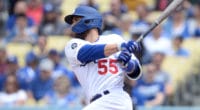 Los Angeles Dodgers catcher Russell Martin hits a single