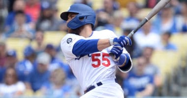 Los Angeles Dodgers catcher Russell Martin hits a single