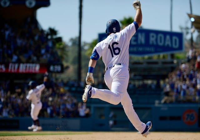 Los Angeles Dodgers catcher Will Smith rounds the bases after a walk-off home run against the Colorado Rockies