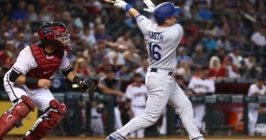 Los Angeles Dodgers catcher Will Smith hits a home run against the Arizona Diamondbacks