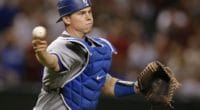 Los Angeles Dodgers catcher Will Smith makes a throw to first base