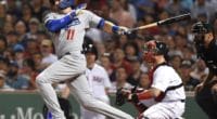 Los Angeles Dodgers center fielder A.J. Pollock hits an RBI single against the Boston Red Sox