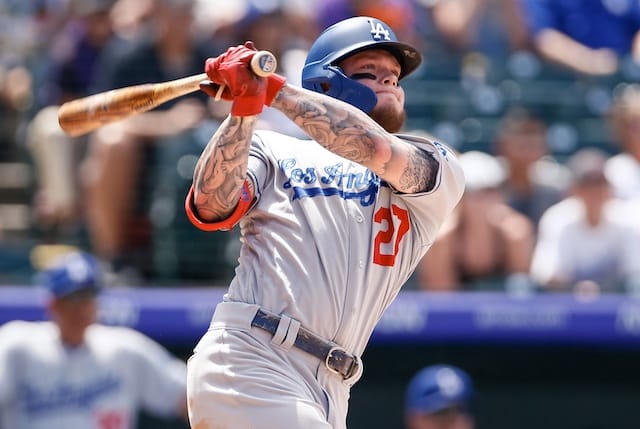 Los Angeles Dodgers outfielder Alex Verdugo hits a double against the Colorado Rockies