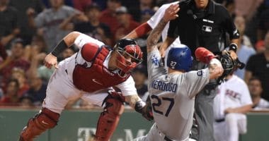 Los Angeles Dodgers outfielder Alex Verdugo is thrown out at home plate against the Boston Red Sox