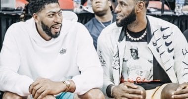 Los Angeles Lakers teammates Anthony Davis and LeBron James watch a Las Vegas Summer League Game