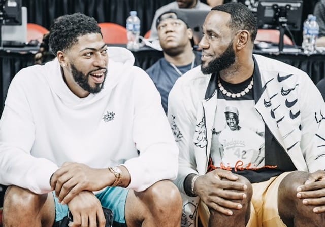 Los Angeles Lakers teammates Anthony Davis and LeBron James watch a Las Vegas Summer League Game