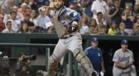 Los Angeles Dodgers catcher Russell Martin throws to first base
