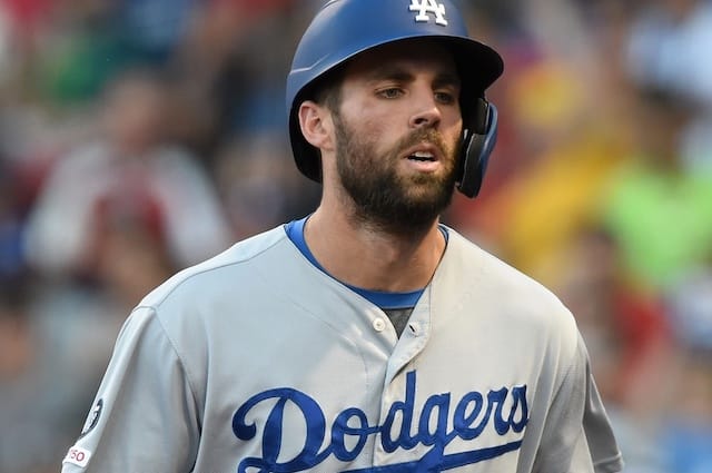Los Angeles Dodgers infielder Chris Taylor walks to the dugout