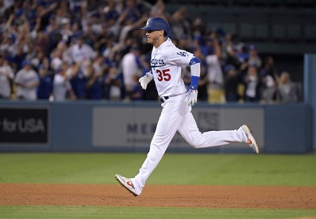 Los Angeles Dodgers right fielder Cody Bellinger rounds the bases after hitting a walk-off home run against the Arizona Diamondbacks