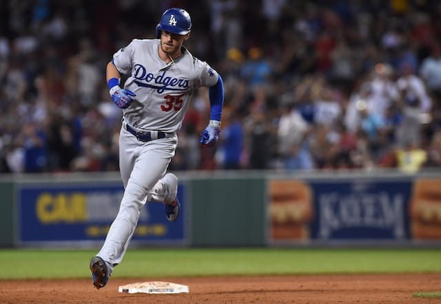 Los Angeles Dodgers right fielder Cody Bellinger rounds the bases after hitting a home run against the Boston Red Sox