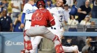 Los Angeles Dodgers third base coach Dino Ebel watches Cody Bellinger on his attempt to score against the Los Angeles Angels of Anaheim