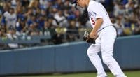 Los Angeles Dodgers shortstop Corey Seager commits an error against the Miami Marlins