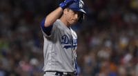 Los Angeles Dodgers first baseman David Freese celebrates after hitting a double against the Boston Red Sox