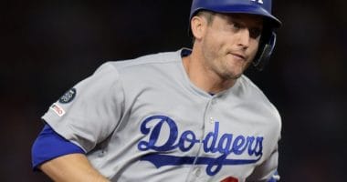 Los Angeles Dodgers first baseman David Freese rounds the bases after hitting a home run