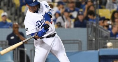 Los Angeles Dodgers first baseman David Freese swings for a pinch-hit single