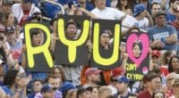 Los Angeles Dodgers fans hold a Hyun-Jin Ryu sign