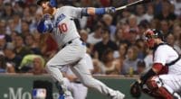 Los Angeles Dodgers third baseman Justin Turner hits a double against the Boston Red Sox