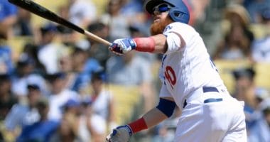Los Angeles Dodgers third baseman Justin Turner hits a home run against the San Diego Padres