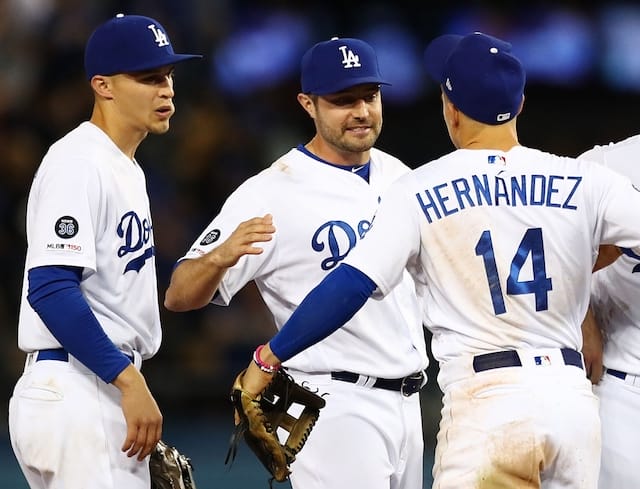 Kiké Hernandez, A.J. Pollock and Corey Seager celebrate after a Los Angeles Dodgers win