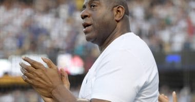 Los Angeles Dodgers part owner Magic Johnson attends a game at Dodger Stadium
