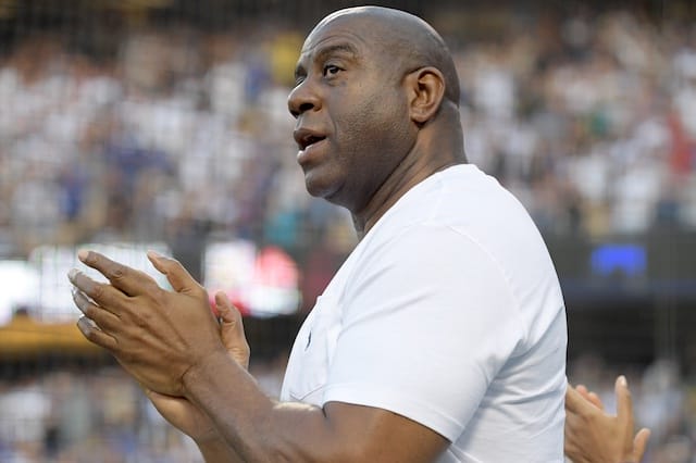 Los Angeles Dodgers part owner Magic Johnson attends a game at Dodger Stadium