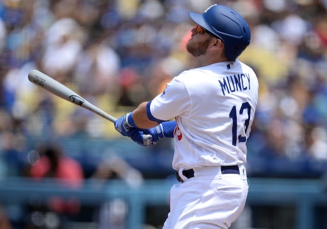 Los Angeles Dodgers infielder Max Muncy watches a home run at Dodger Stadium