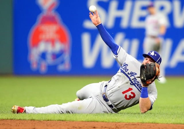 Los Angeles Dodgers infielder Max Muncy makes a diving stop during the 2019 MLB All-Star Game at Progressive Field