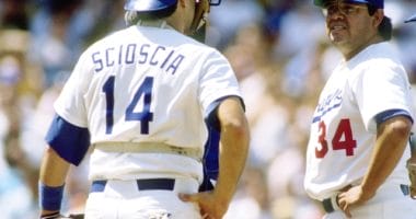 Los Angeles Dodgers teammates Mike Scioscia and Fernando Valenzuela during a game at Dodger Stadium