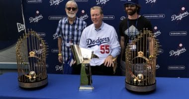 Orel Hershiser poses with World Series trophies during 2018 Dodgers All-Access at Dodger Stadium