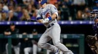 Los Angeles Dodgers catcher Will Smith hits a double against the Colorado Rockies