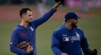 Los Angeles Dodgers relief pitcher Joe Kelly gestures to the crowd while walking out to the bullpen at Fenway Park