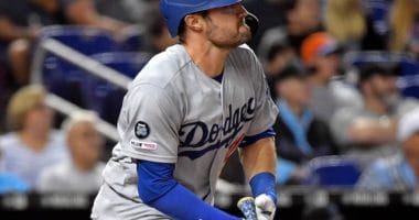 Los Angeles Dodgers center fielder A.J. Pollock hits a double against the Miami Marlins