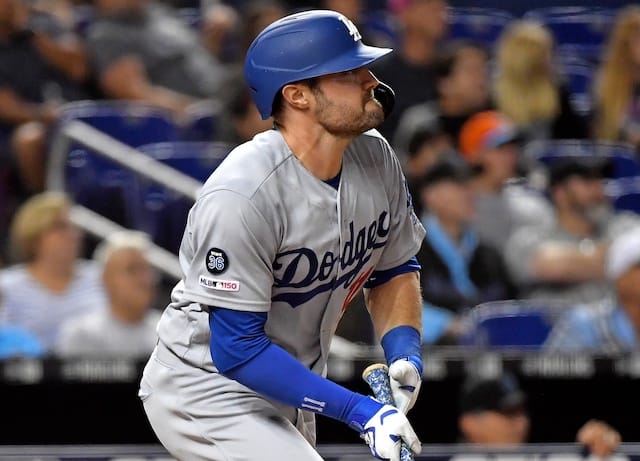 Los Angeles Dodgers center fielder A.J. Pollock hits a double against the Miami Marlins