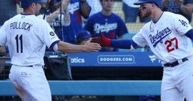 Los Angeles Dodgers outfielders A.J. Pollock and Alex Verdugo celebrate at Dodger Stadium