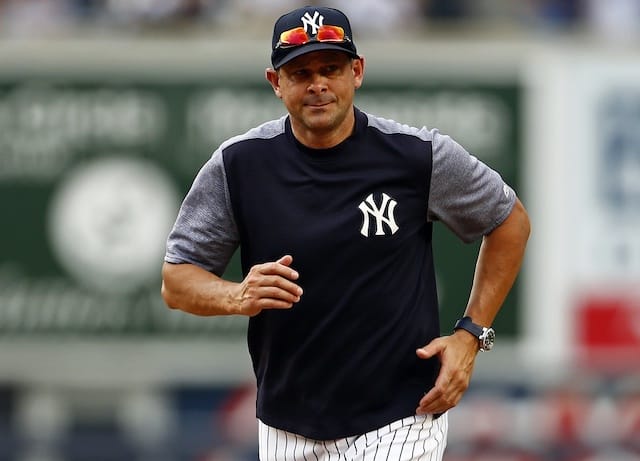 New York Yankees manager Aaron Boone runs off the field at Yankee Stadium