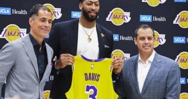 Los Angeles Lakers general manager Rob Pelinka and head coach Frank Vogel with Anthony Davis during his introductory press conference