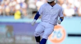Los Angeles Dodgers utility player Chris Taylor hits a double against the New York Yankees