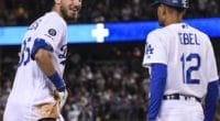 Los Angeles Dodgers All-Star Cody Bellinger reacts after his pants fall down during a game against the Toronto Blue Jays