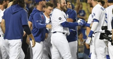 Los Angeles Dodgers teammates Cody Bellinger, Dylan Floro, Kiké Hernandez, Clayton Kershaw and Max Muncy celebrate after a walk-off win