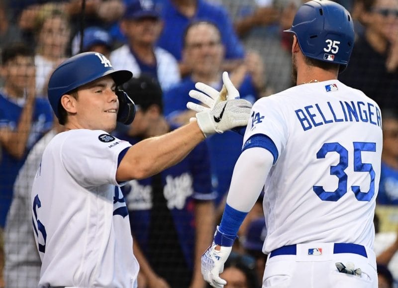 Los Angeles Dodgers teammates Cody Bellinger and Will Smith celebrate after a home run