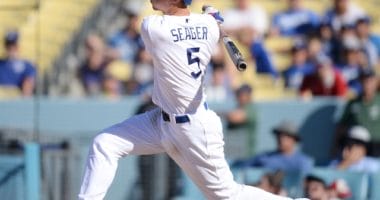 Los Angeles Dodgers shortstop Corey Seager reaches on an error