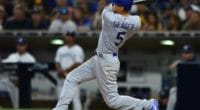 Los Angeles Dodgers shortstop Corey Seager hits a double against the San Diego Padres