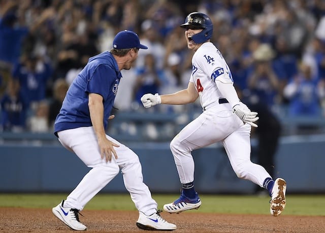 David Freese and Kiké Hernandez celebrate a Los Angeles Dodgers walk-off win