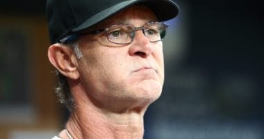 Miami Marlins manager Don Mattingly looks on from the dugout