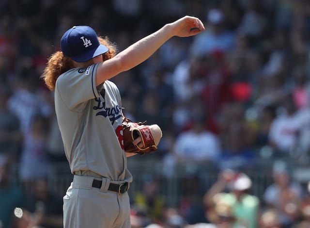 Los Angeles Dodgers pitcher Dustin May reacts during a game against the Atlanta Braves