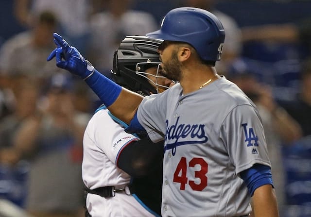 Los Angeles Dodgers infielder Edwin Rios reacts after hitting a home run